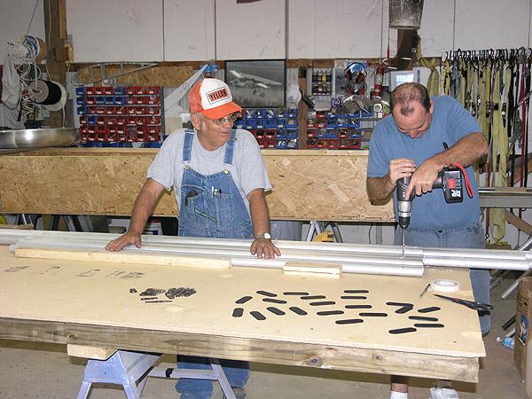 drillingspars.JPG - Jim and Robert working on the wings.